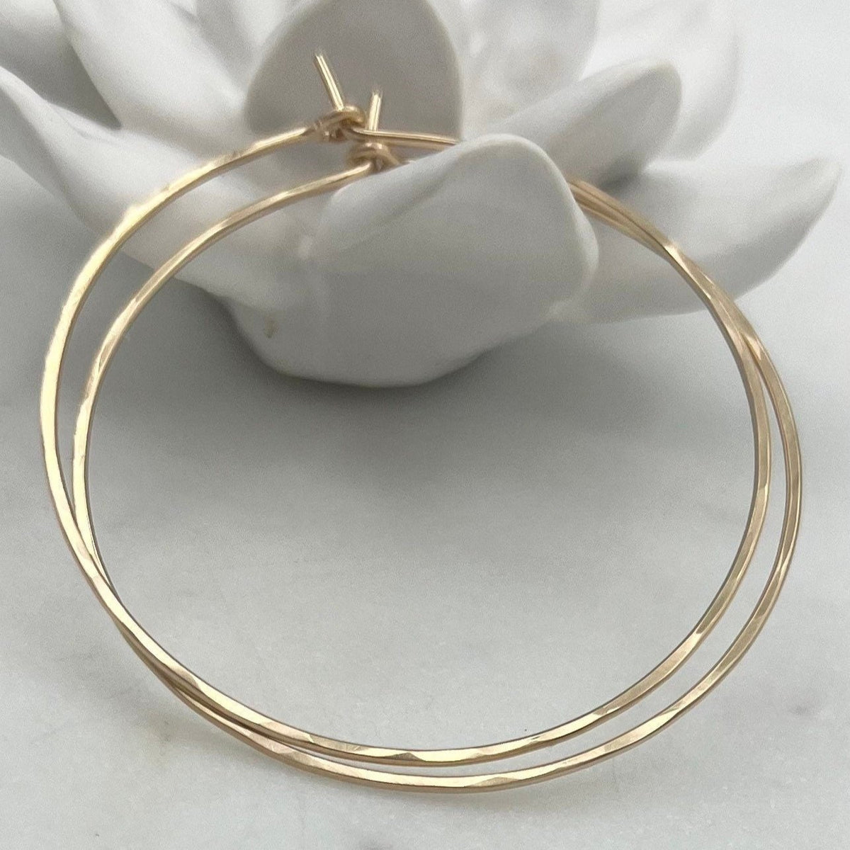 18 guage 14k gold filled hoop earrings. round threader hoop earrings. Laurane Elisabeth specializing in delicate, lightweight minimalist jewelry. Always nickel free.