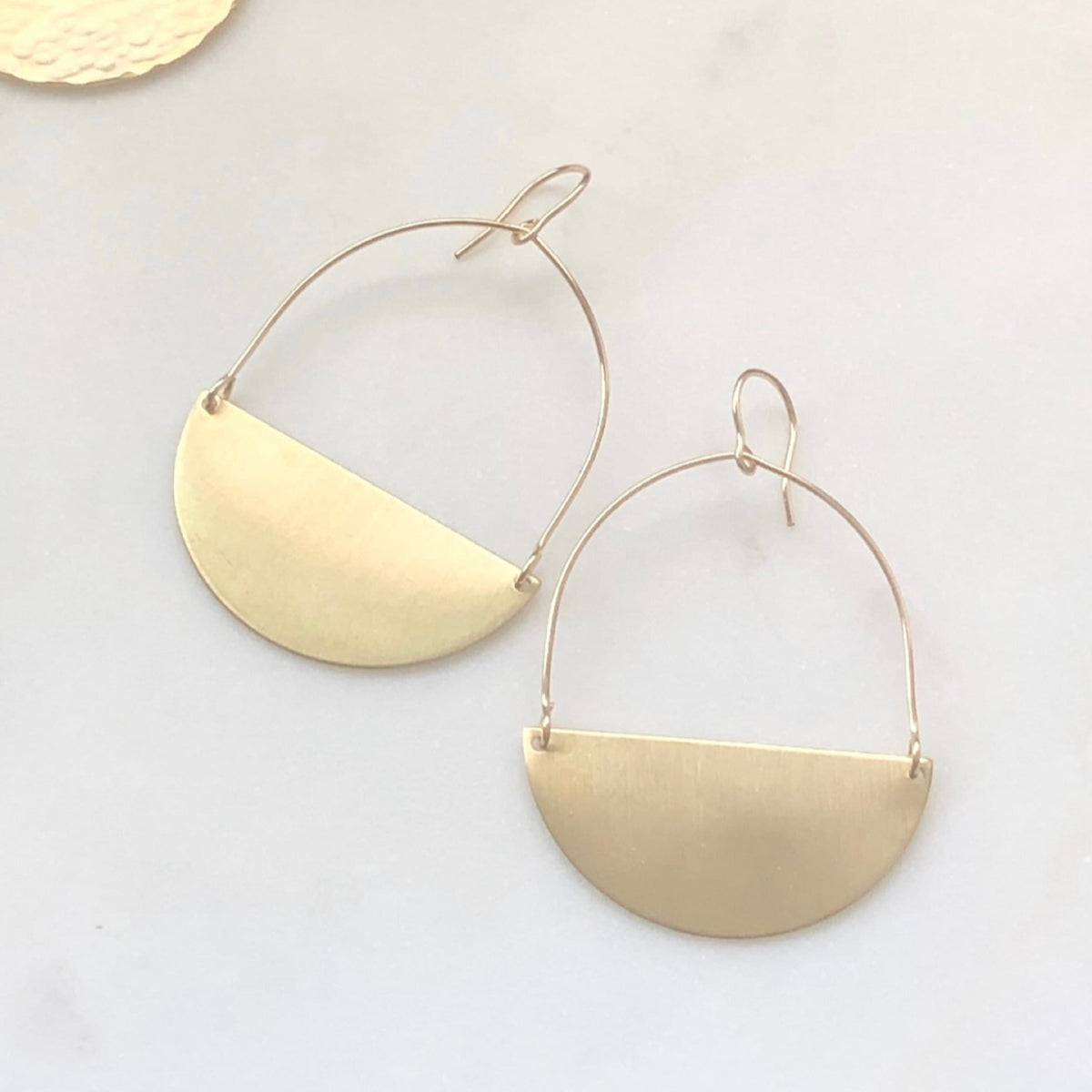 Brass half moon earrings in smooth finish from laurane elisabeth