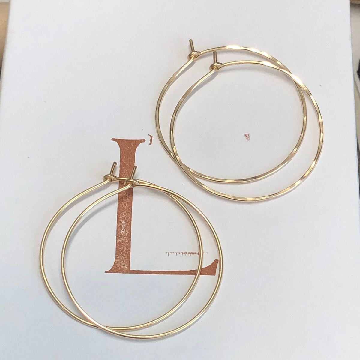 18 guage 14k gold filled hoop earrings. round threader hoop earrings. Laurane Elisabeth specializing in delicate, lightweight minimalist jewelry. Always nickel free.