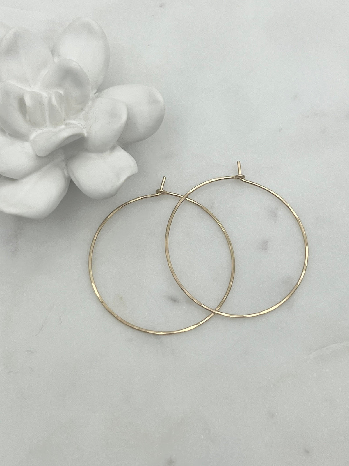 18 guage 14k gold filled hoop earrings. round threader hoop earrings. Laurane Elisabeth specializing in delicate, lightweight minimalist jewelry. Always nickel free.