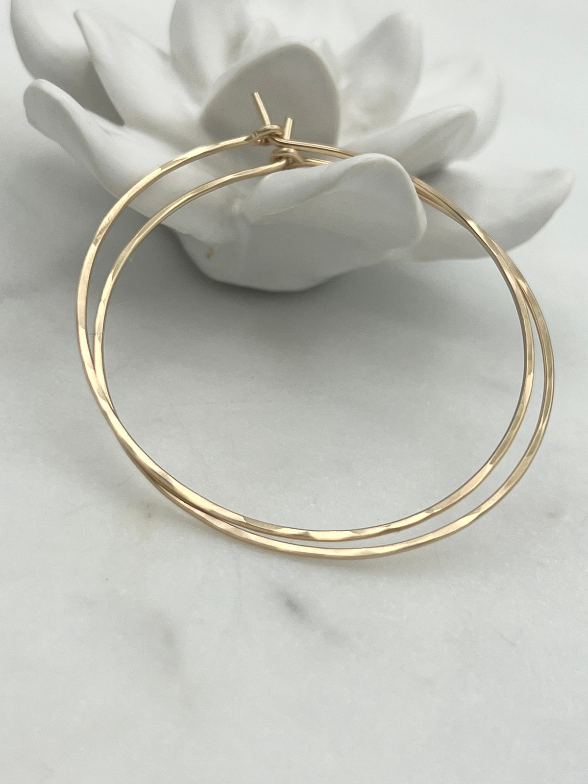 18 guage 14k gold filled hoop earrings. round threader hoop earrings. Laurane Elisabeth specializing in delicate, lightweight minimalist jewelry. Always nickel free.