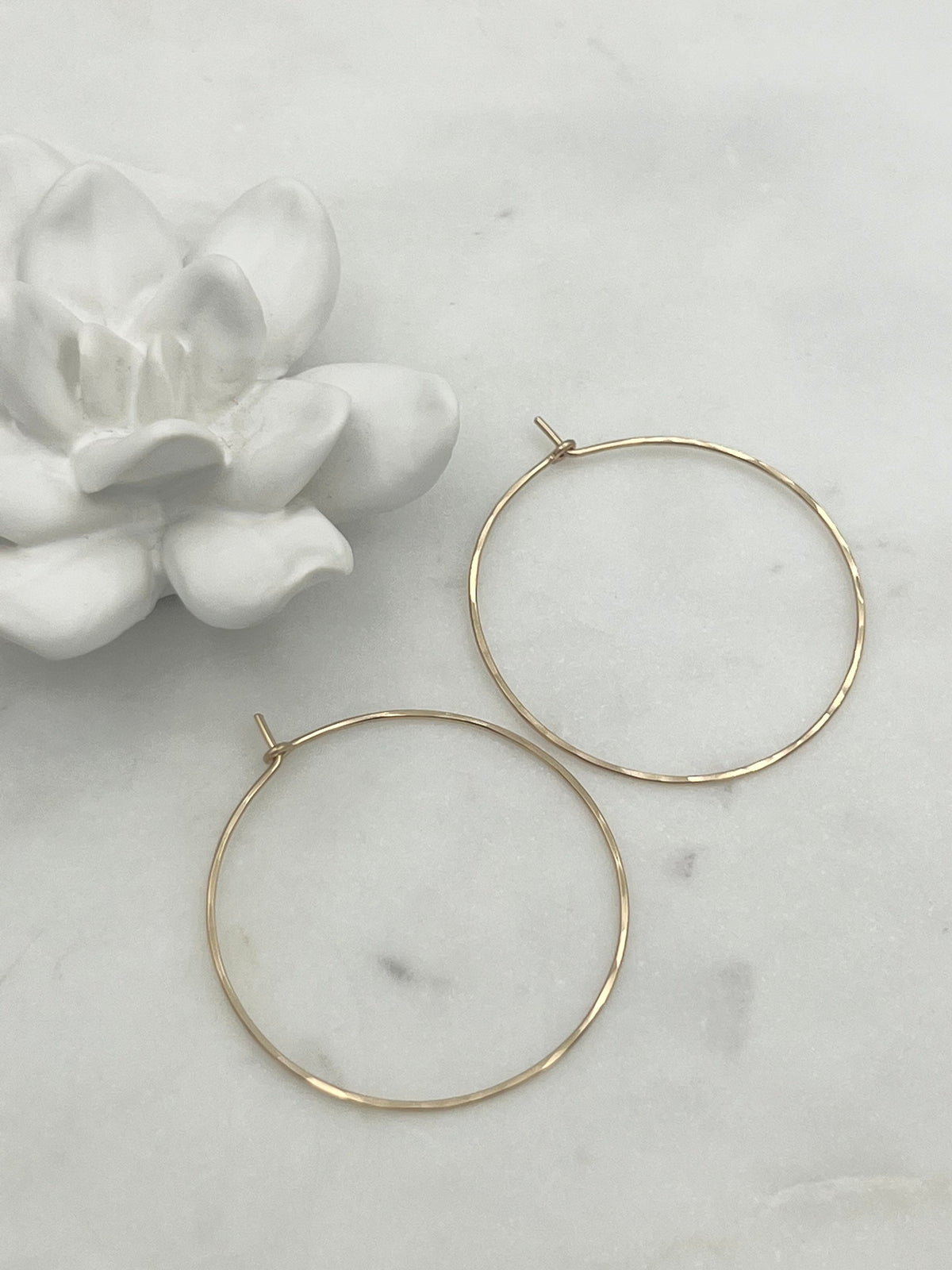 18 guage 14k gold filled hoop earrings. round threader hoop earrings. Laurane Elisabeth specializing in delicate, lightweight minimalist jewelry. Always nickel free.