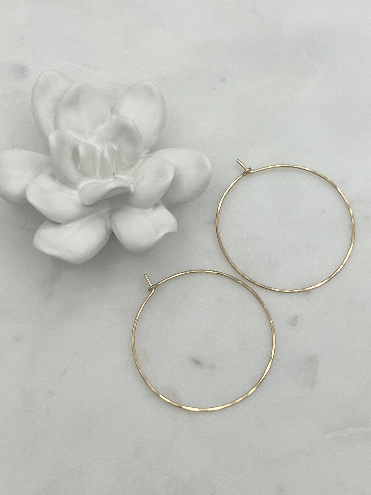 18 guage 14k gold filled hoop earrings. round threader hoop earrings. Laurane Elisabeth specializing in delicate, lightweight minimalist jewelry. Always nickel free.